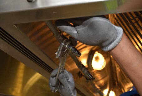 close-up-of-man-using-a-spanner